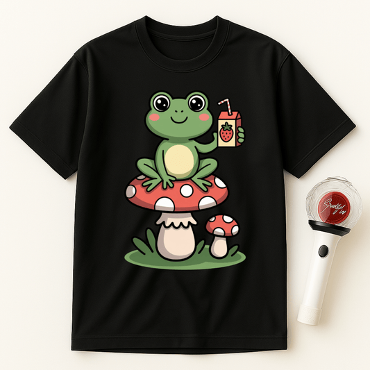 FROG SITTING ON MUSHROOM DRINKING STRAWBERRY UNISEX T-SHIRT